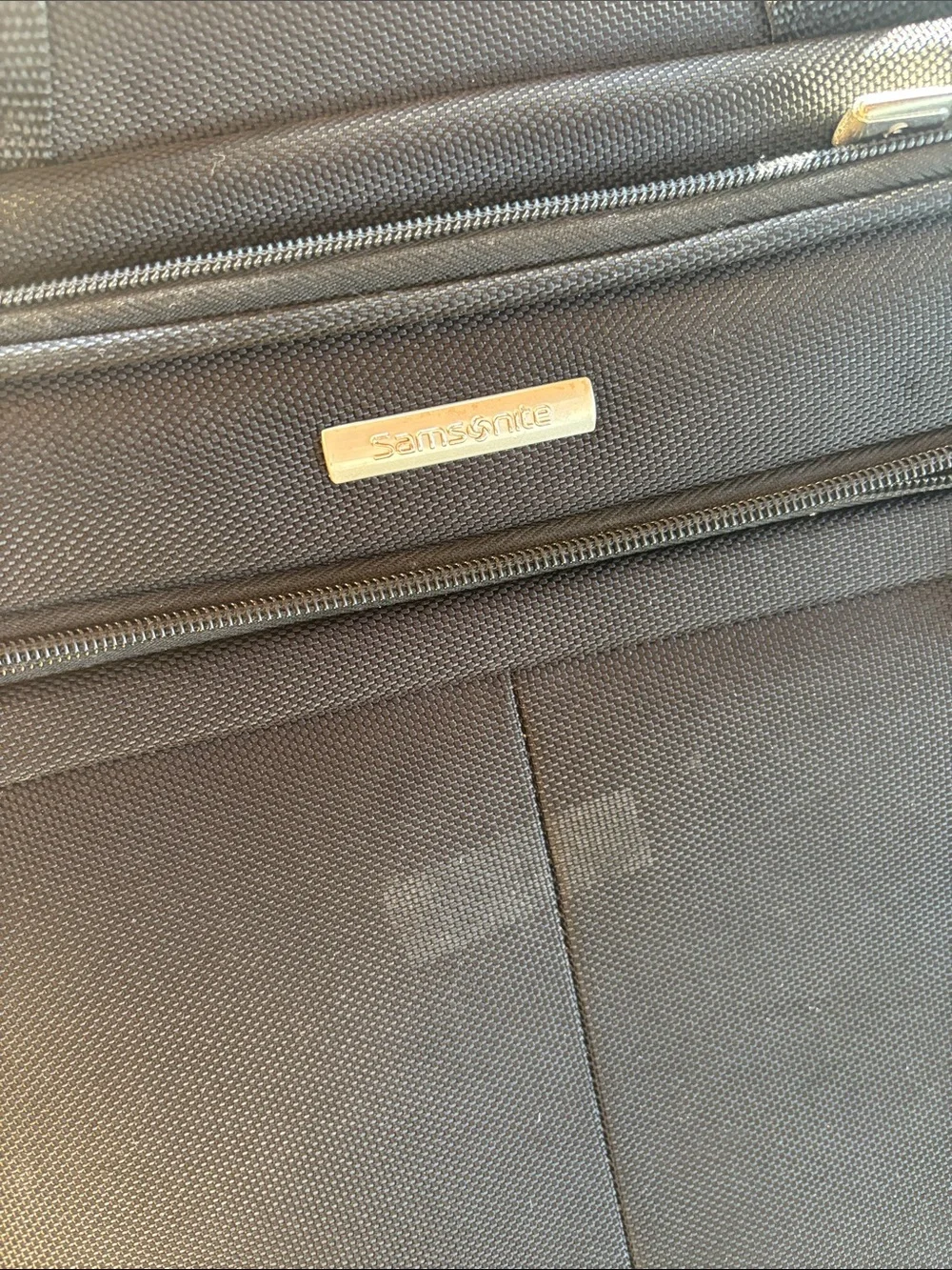 Black Samsonite wheeled business case